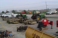 Mainteance heavy equipment in parking lot