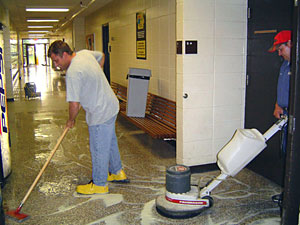 Custodians cleaning floors