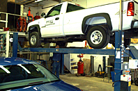 Truck on lift in shop