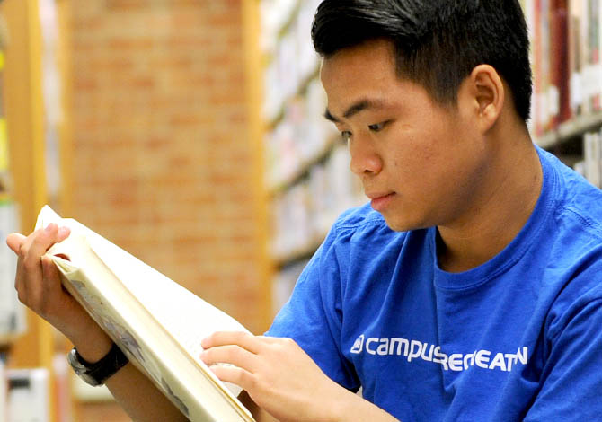 DMACC student studying in a library