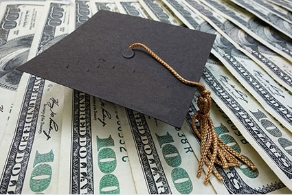 graduation cap and money