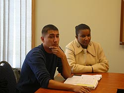 Two people sitting at a table