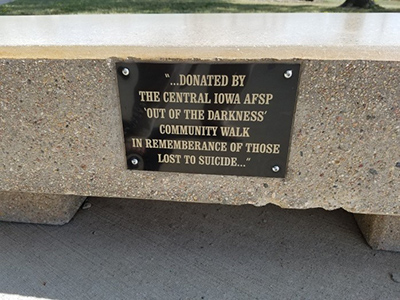 Plaque for bench in plaza by the lake 